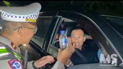 Macet Panjang, Kepedulian Tak Surut: Kisah Polisi Sukabumi Bantu Pemudik dan Wisatawan